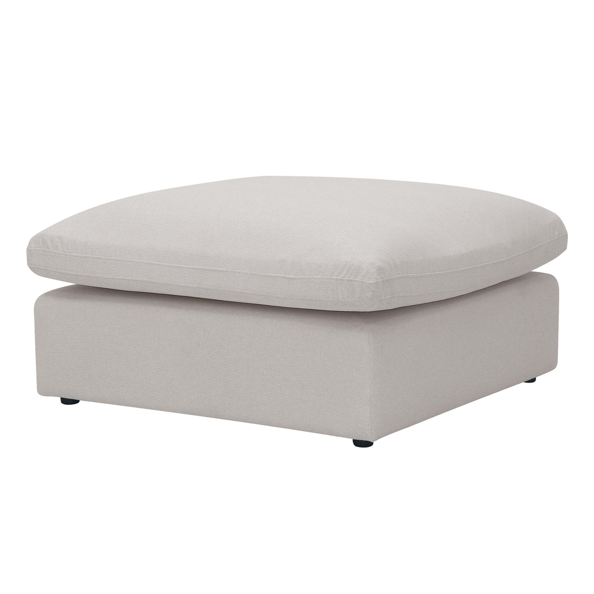 Light beige square ottoman with plush top and black feet on a white background