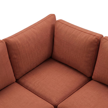 Close-up of terracotta sectional cushions and textured upholstery