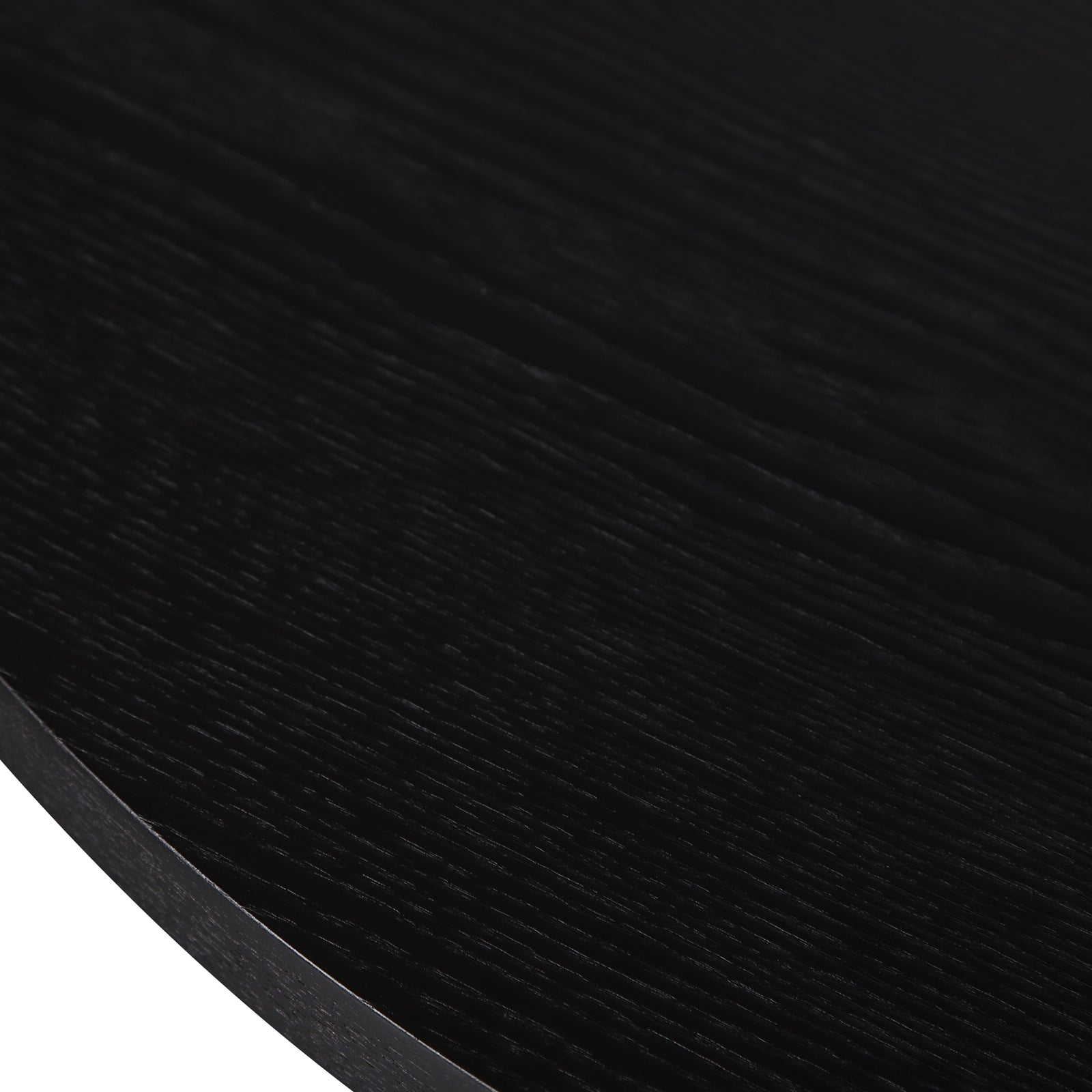 Close-up of the Gigi 180cm Oval Wooden Dining Table in Black, showcasing its dark wood-grain texture and smooth, refined edge, highlighting the elegant and durable design for modern dining spaces.