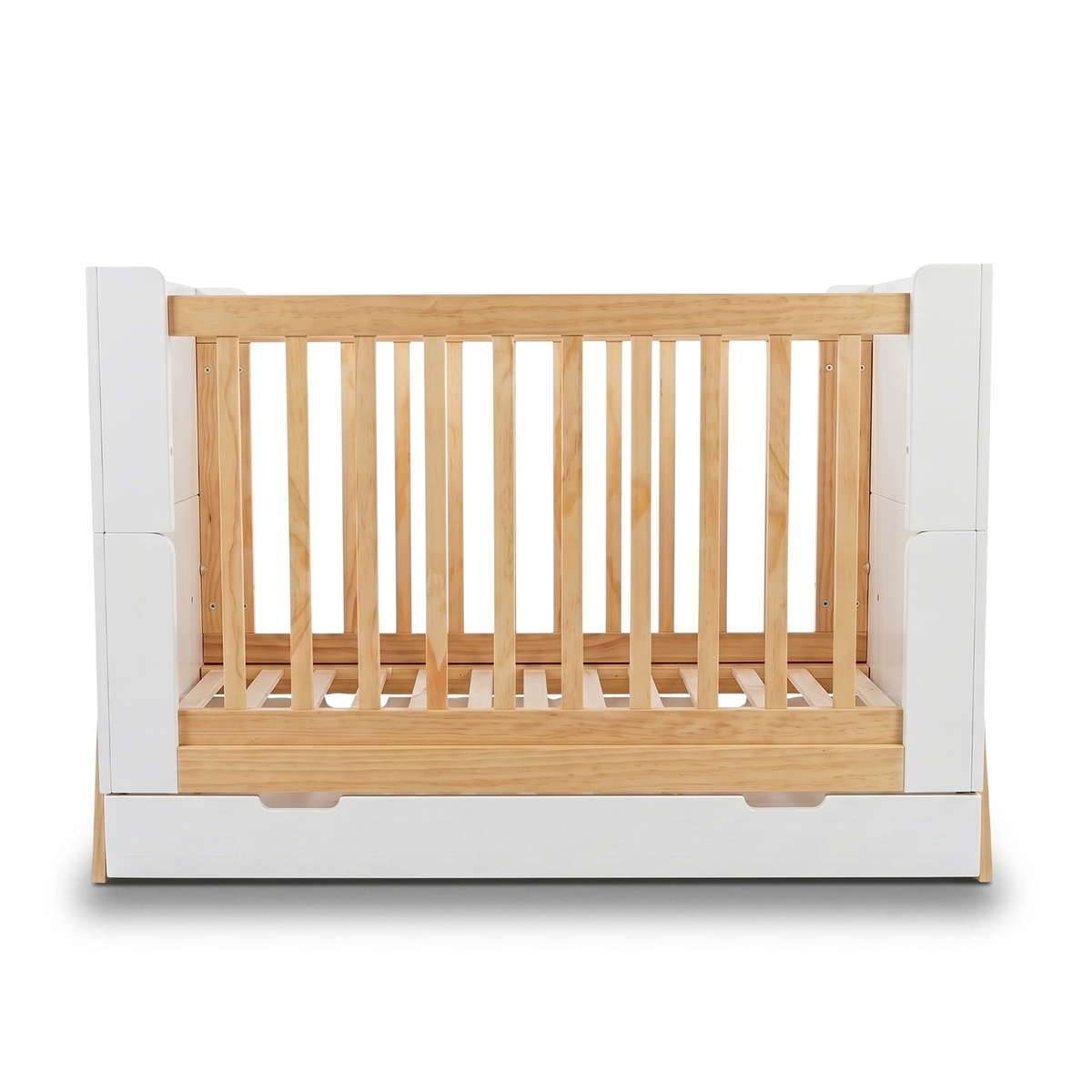 Front view of crib with wood slats and white side panels