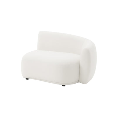 White upholstered accent chair on white background