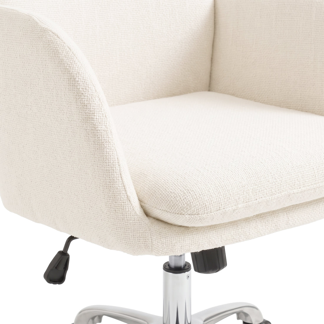 Close-up of the seat and base of a light beige upholstered chair on a white background