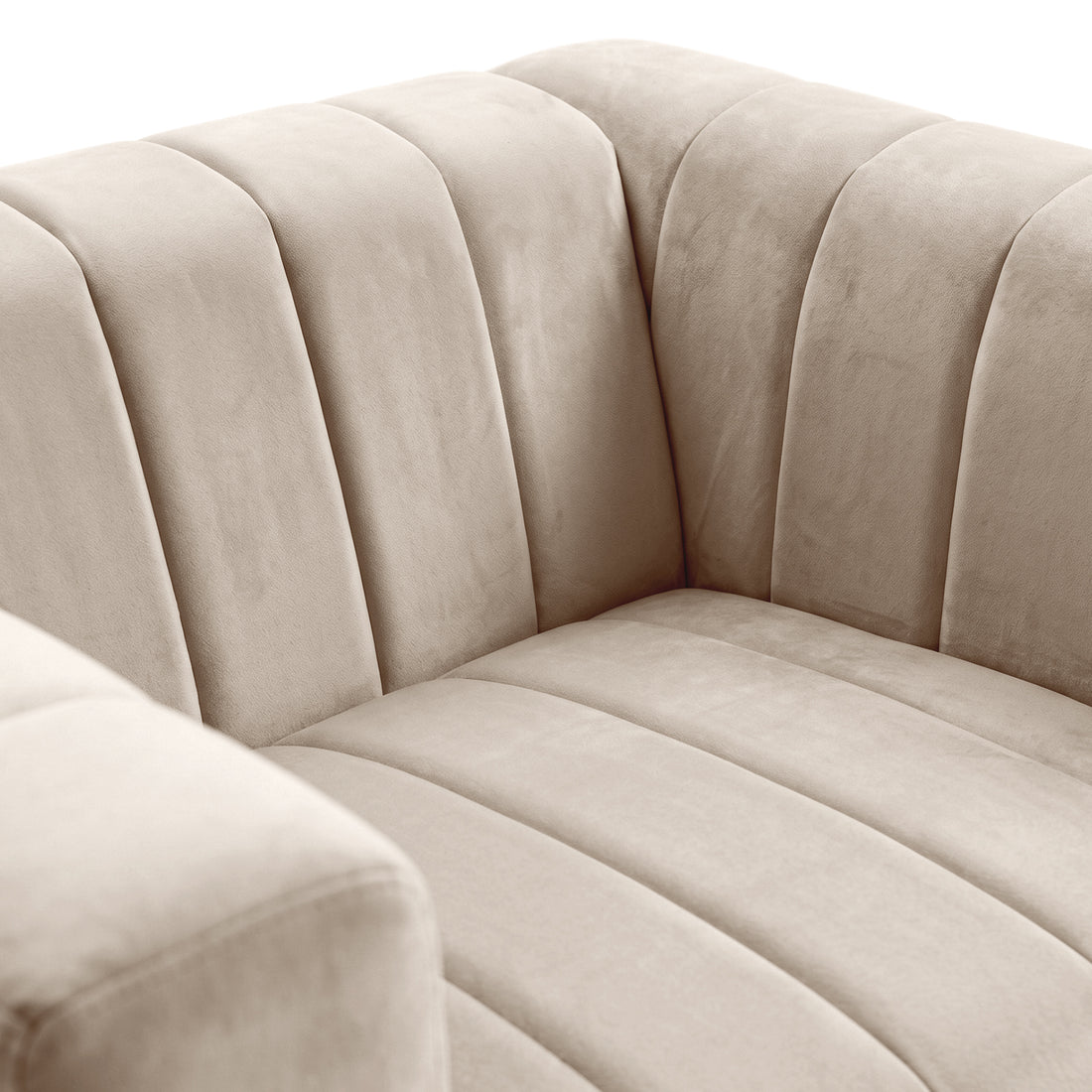 Close-up of beige upholstered sofa seat and armrest on a white background