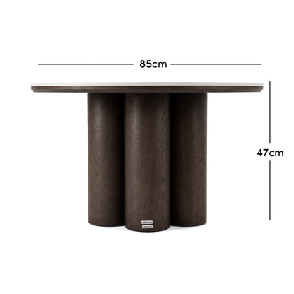 Dark wood round table with measurements shown as 85 cm wide and 47 cm high - Dimensions