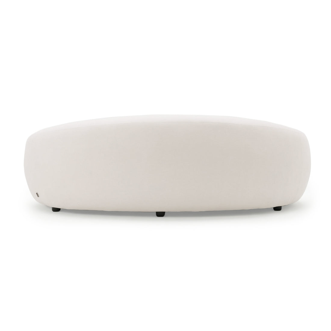 Round upholstered ottoman on white background