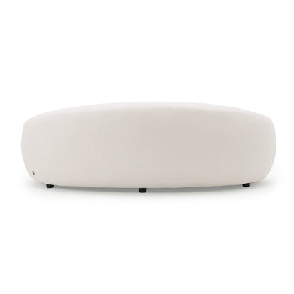 Round upholstered ottoman on white background