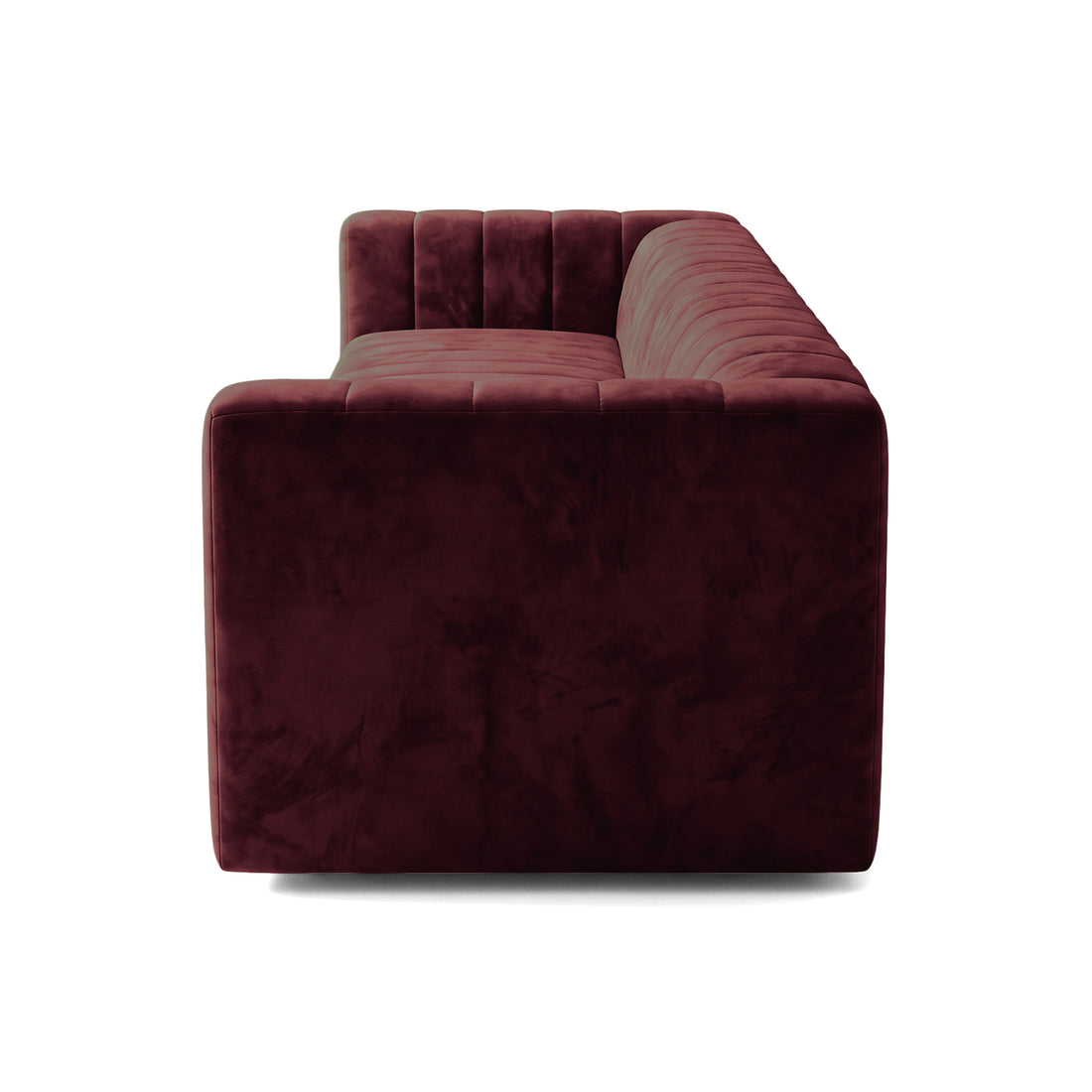 Side profile of a burgundy sofa on a white background