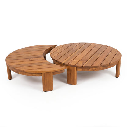 Set of two coordinating wooden coffee tables with round and crescent shapes on white background