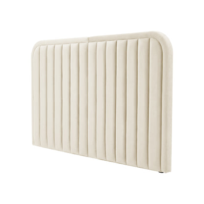 Beige upholstered headboard with vertical channel paneling on white background
