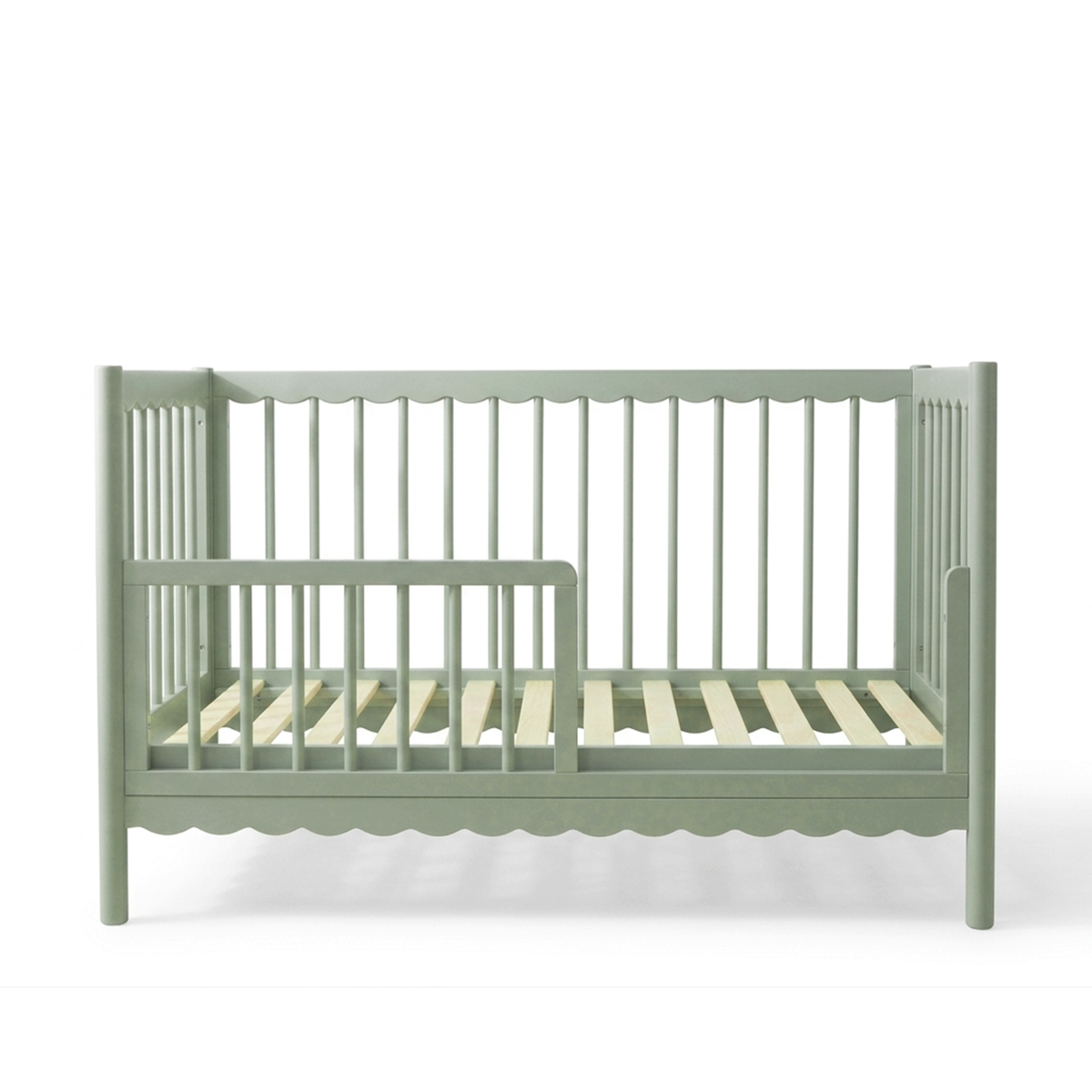 Sage green children's crib on white background
