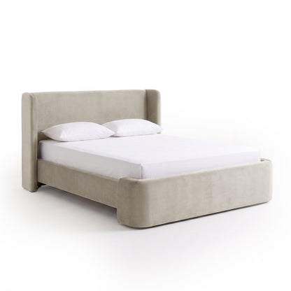 Modern upholstered bed with headboard and footboard on a white background