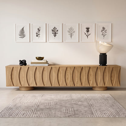 Wooden sideboard styled in a modern room with decor and wall art