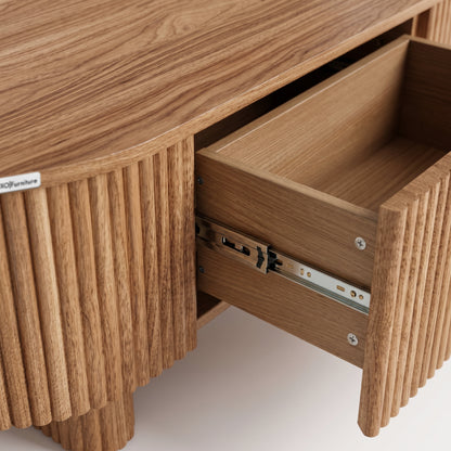 Close-up of a wooden drawer detail on a white background