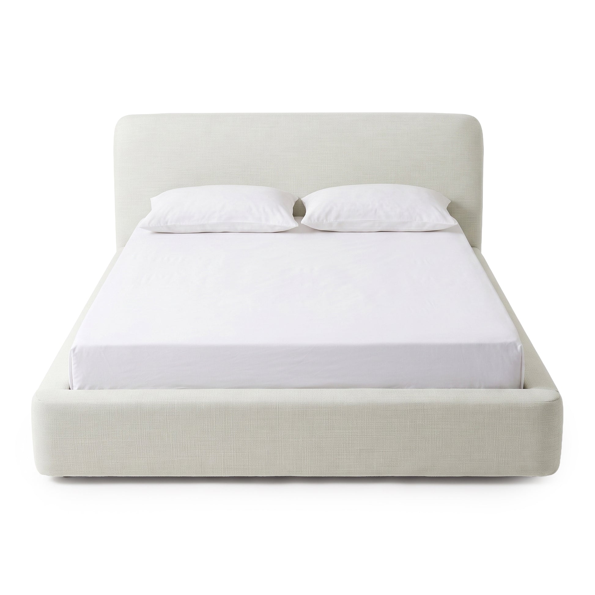 Full upholstered bed with mattress and two pillows on a white background