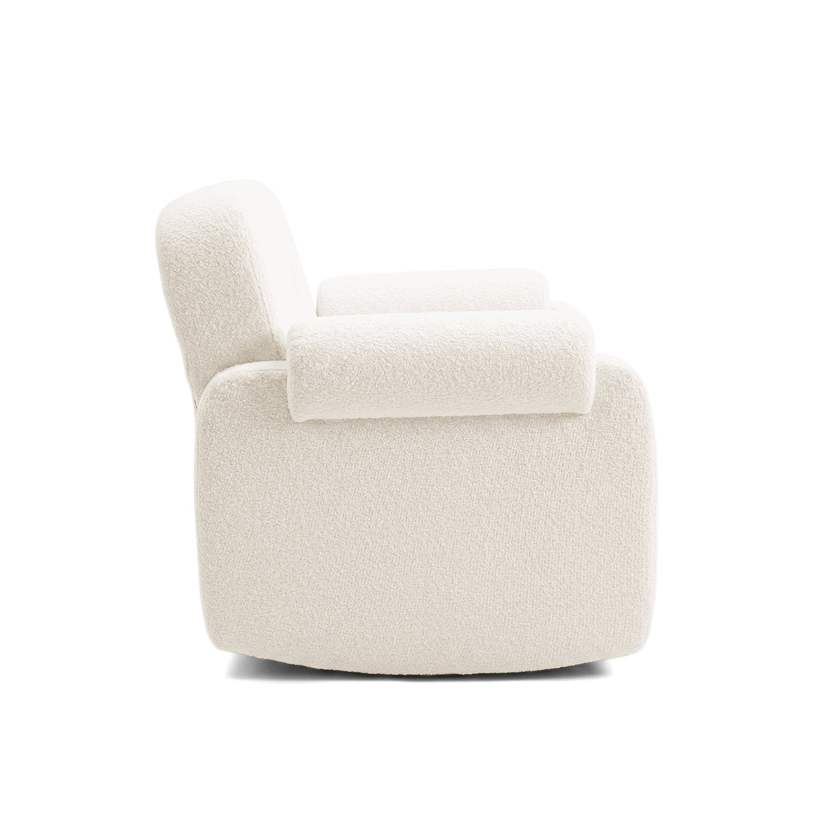 Side profile of plush armchair on white background