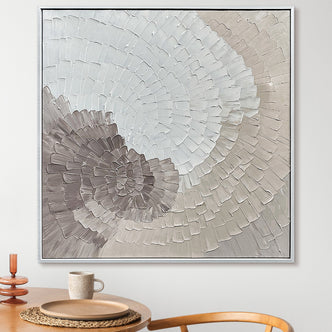 Zendaya Canvas Wall Art 105 x 105cm in White, features overlapping fan-shaped brushstrokes in neutral tones within a sleek silver frame, enhancing a minimalist dining nook with its textured, modern aesthetic.