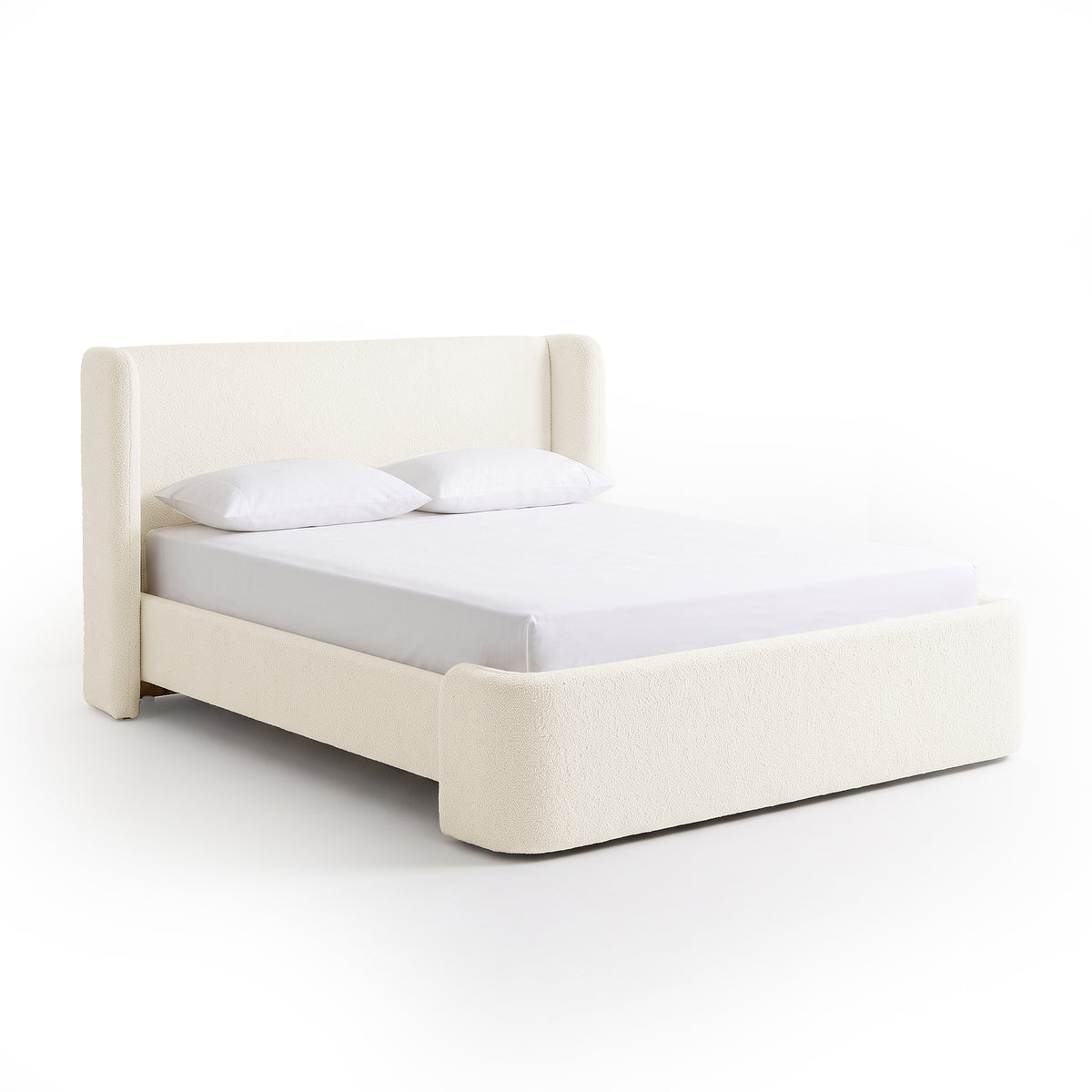 Full upholstered bed on a plain white background