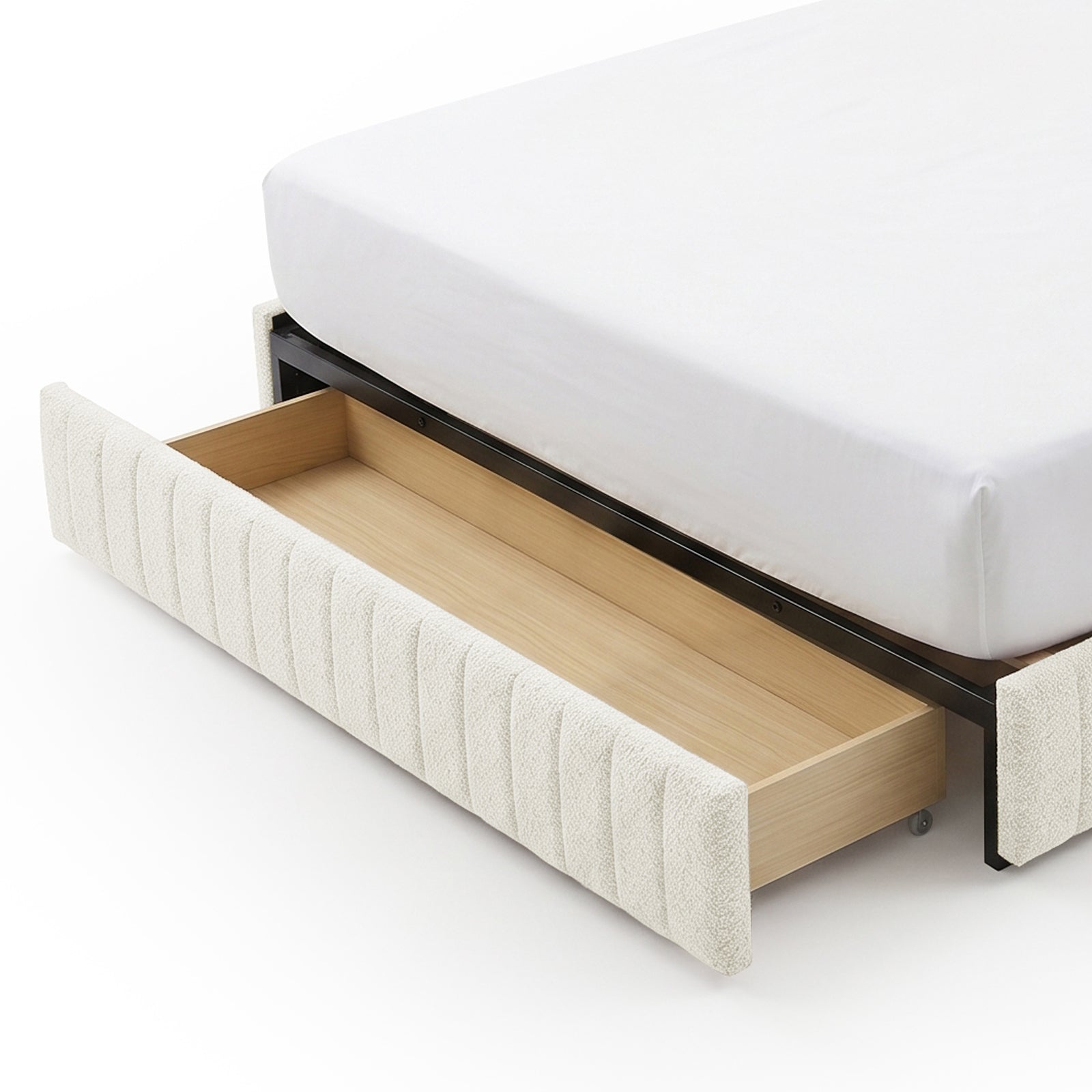 Close-up of under-bed storage drawer in upholstered bed frame on white background
