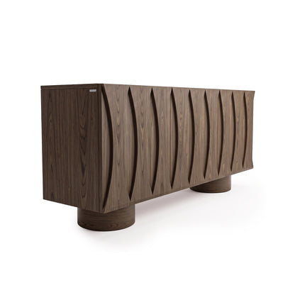 Modern dark wood sideboard with sculptural wavy front on a white background