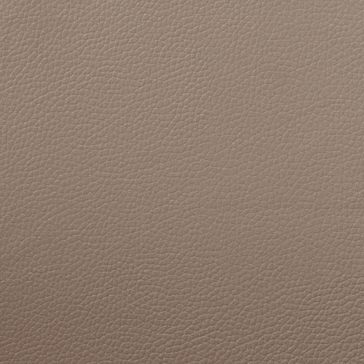 Close-up of textured leather-like upholstery material