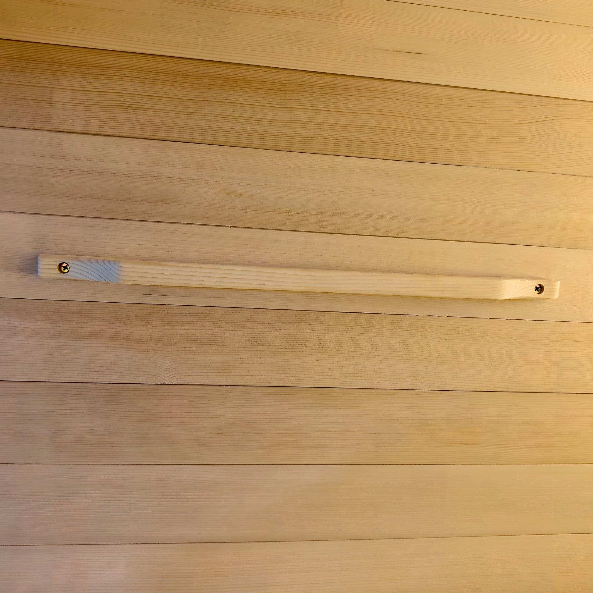 Wooden handle mounted on a wooden paneled wall