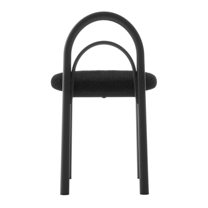 Modern black upholstered stool or chair with curved backrest on a white background
