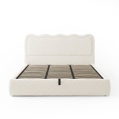 Fabric-upholstered bed frame with wooden slats on white background
