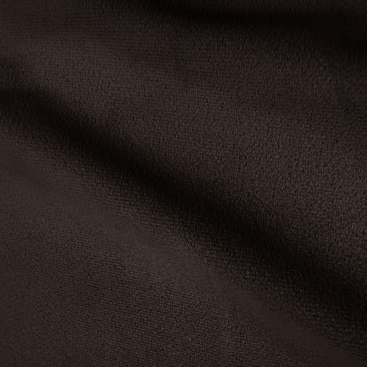 Macro shot of dark brown velvet fabric texture