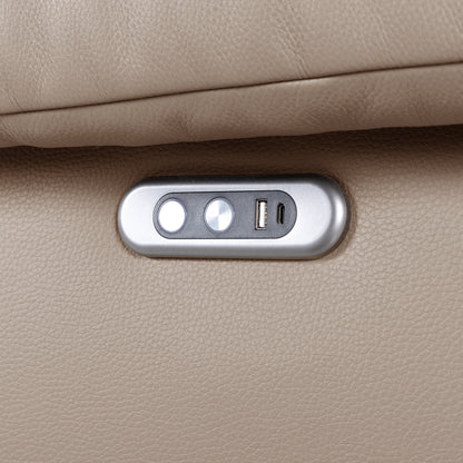 Close-up of a sofa control panel with buttons and USB port in beige upholstery