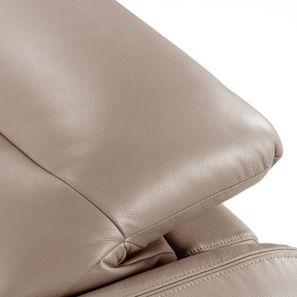 Close-up of taupe leather sofa armrest and seat stitching on white background