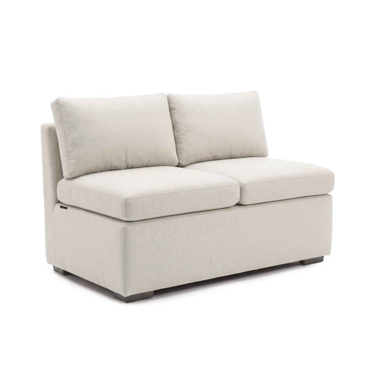 Complete cream armless loveseat viewed from the front three-quarter angle