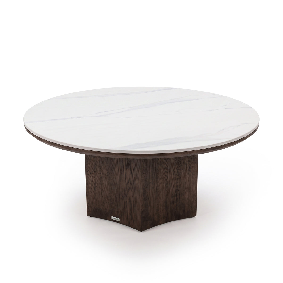 Round table with white marble-like tabletop and dark wooden pedestal base isolated on a white background.