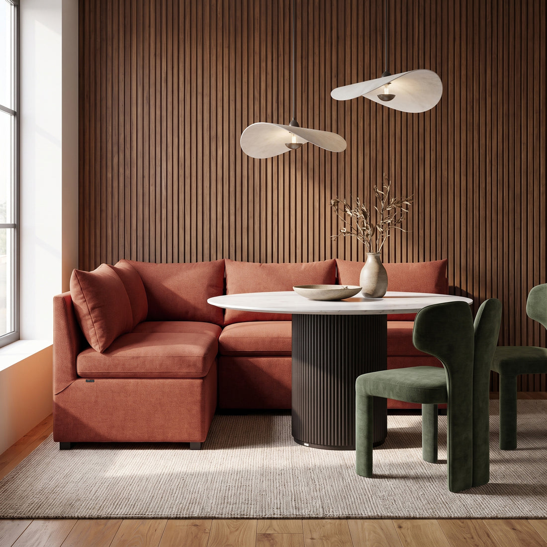 Terracotta sectional sofa in a modern dining and living room
