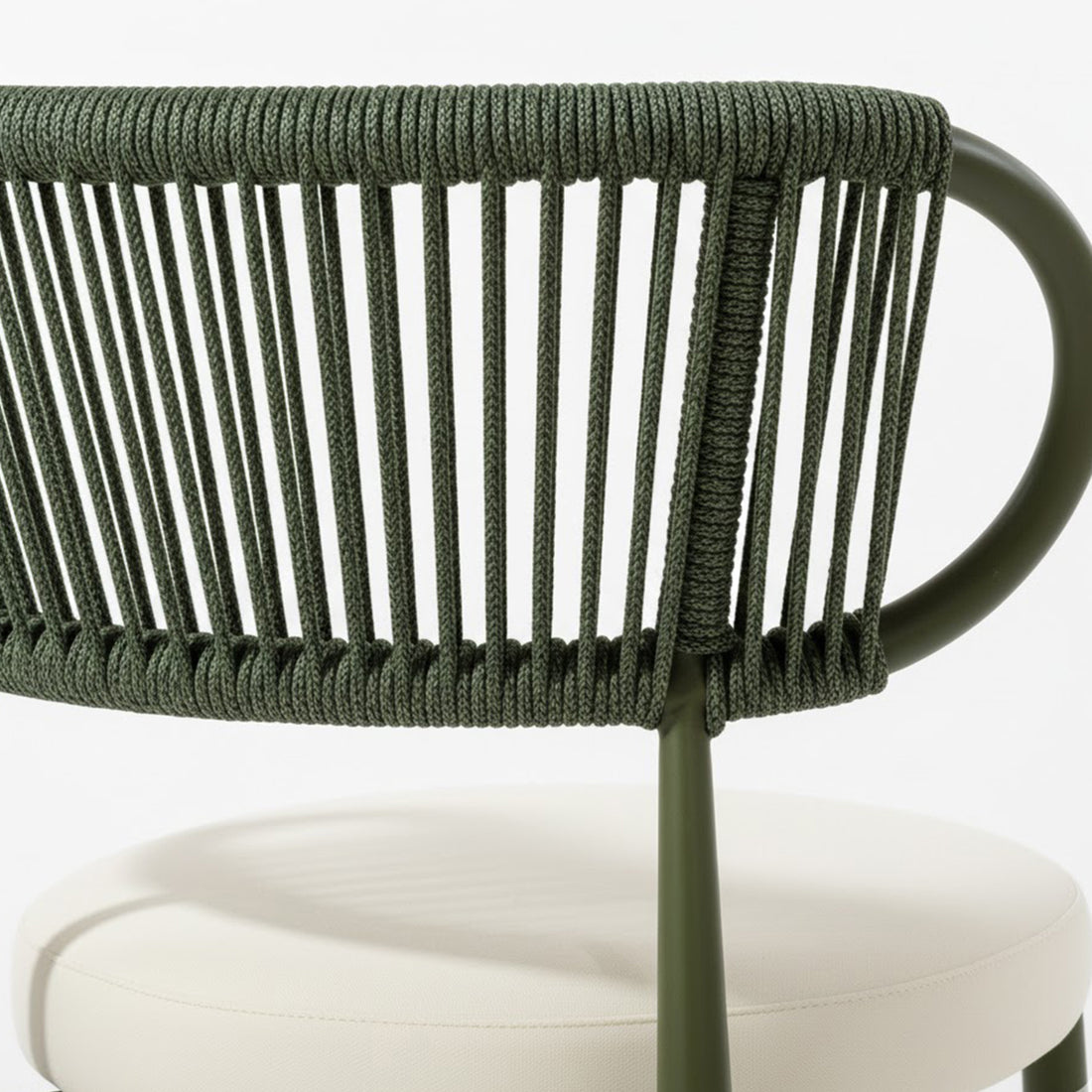 Cabria 9 Piece Sintered Stone Outdoor Dining Set in Green features a modern chair with an olive green, powder-coated metal frame and a backrest of vertical rope strands, paired with an off-white cushion.