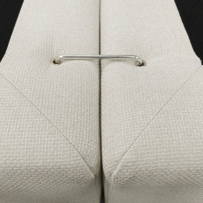 Close-up of upholstered furniture connector and fabric texture