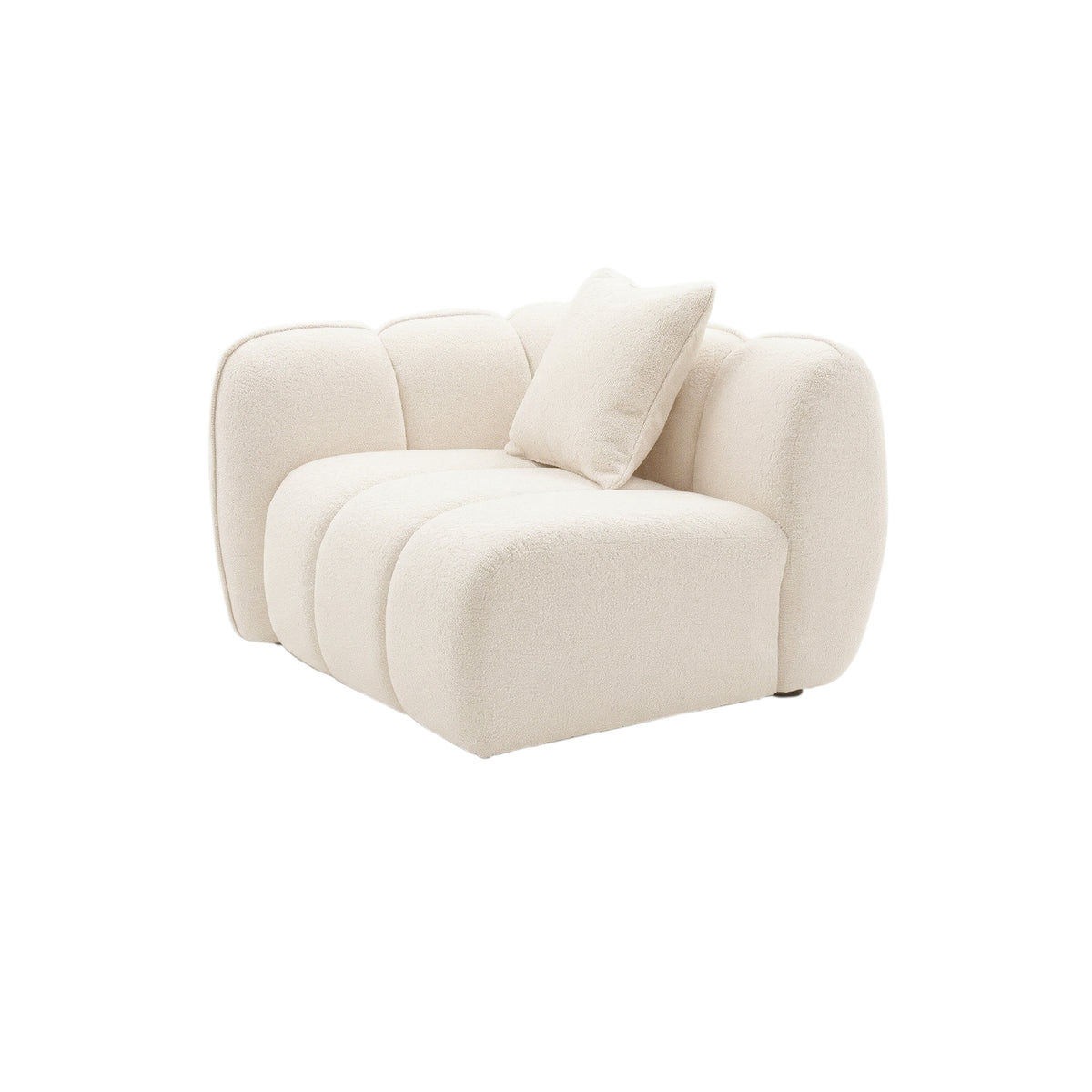 Modern cream-colored armless accent chair with plush pillow on white background