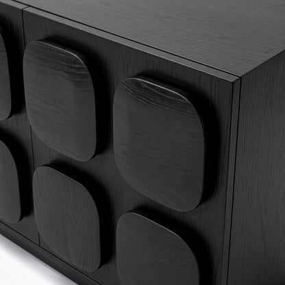 Close-up of a black cabinet with raised square panel details