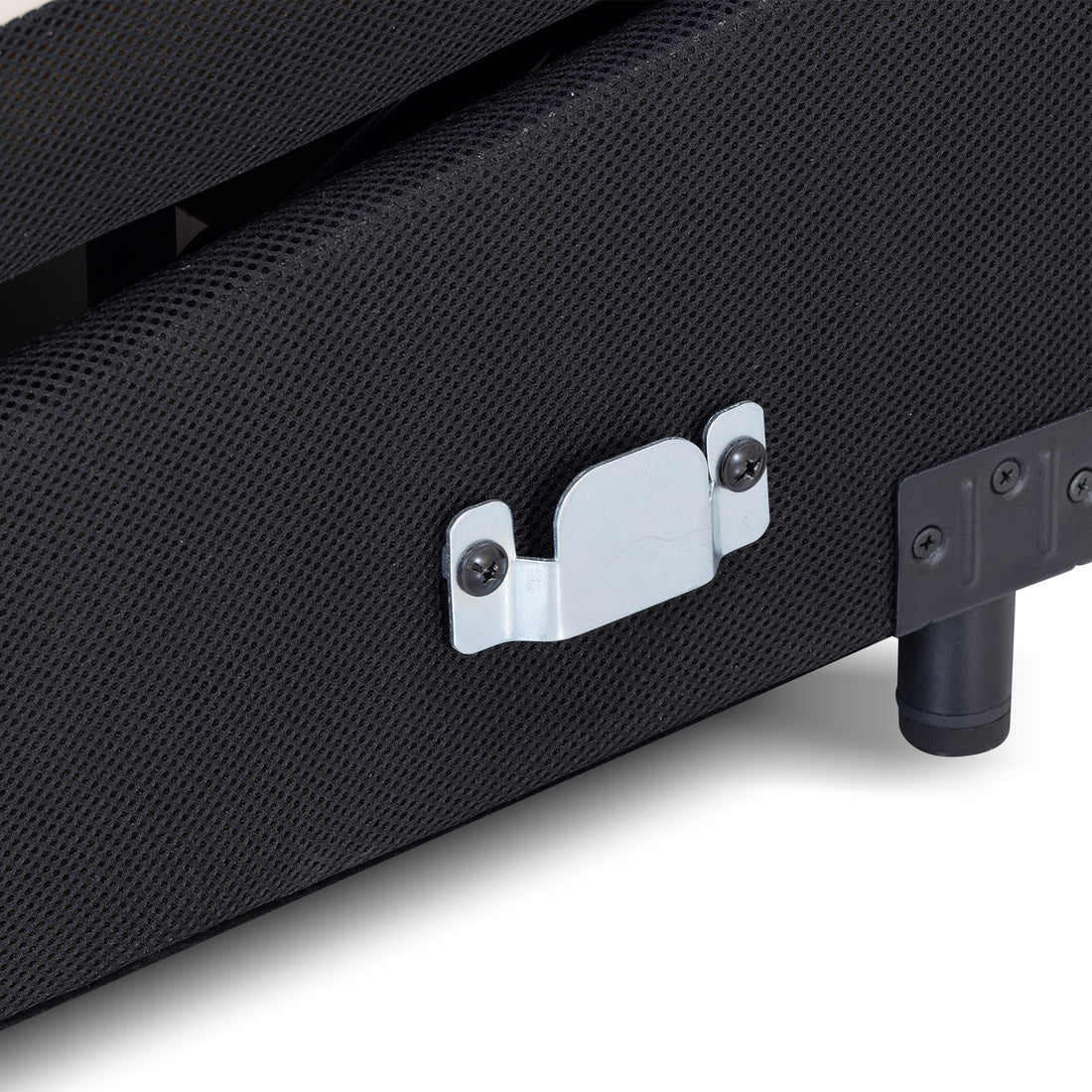 Close-up of a black furniture edge with a metal latch and leg on a white background.