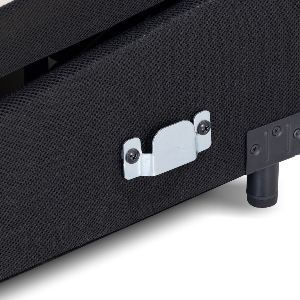 Close-up of a black furniture edge with a metal latch and leg on a white background.