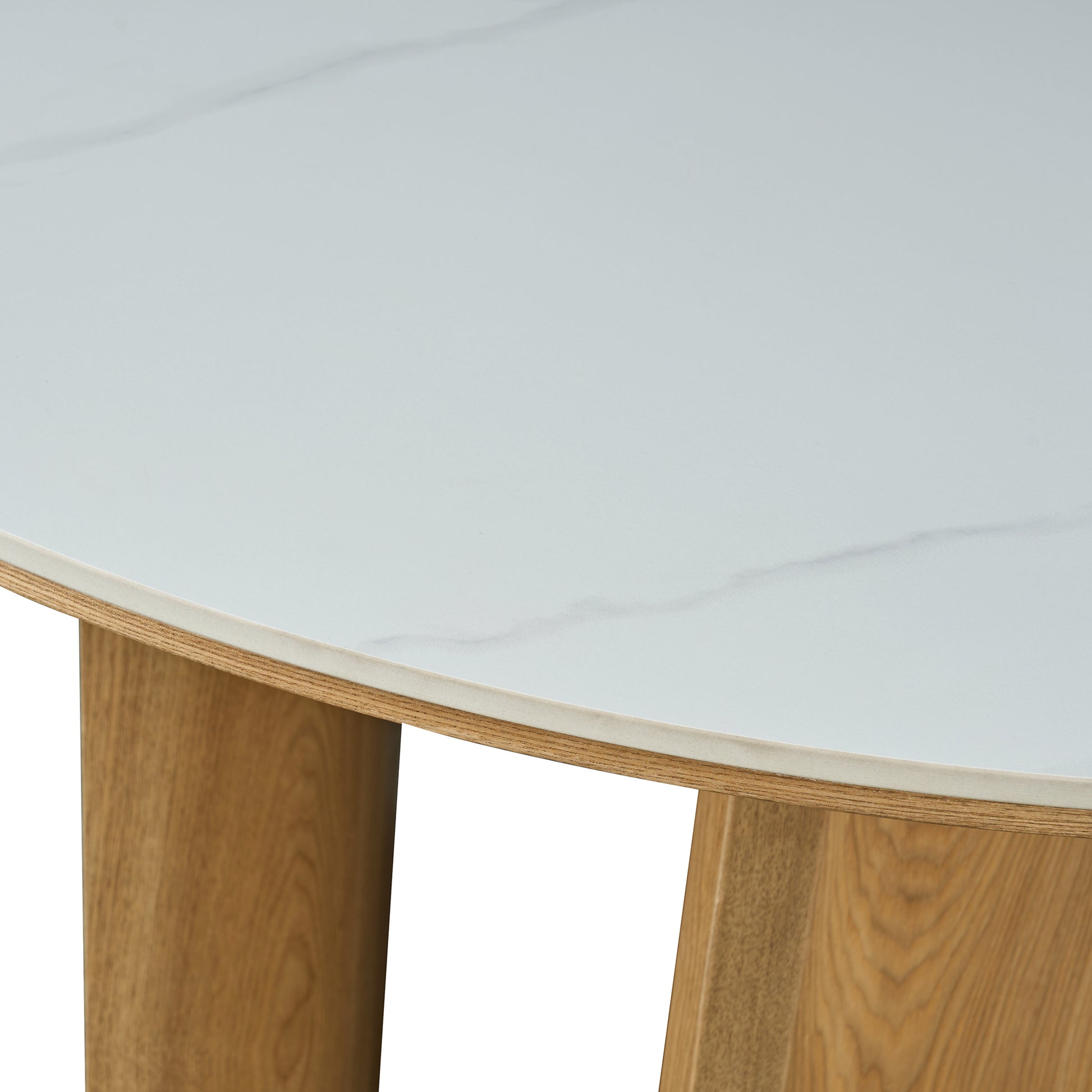 Close-up of table edge and wooden legs on a white background