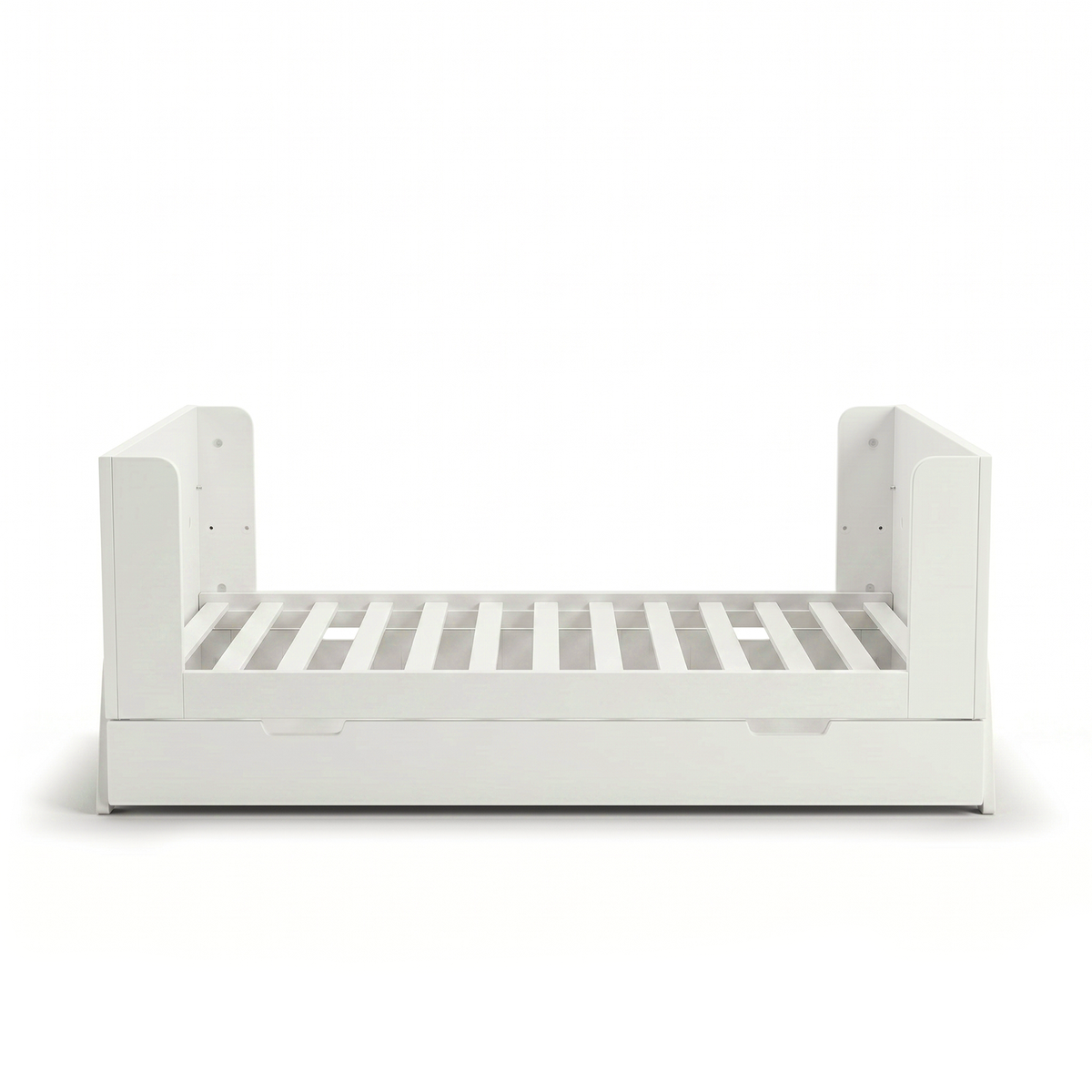 White toddler bed frame on white background with partial guard rails and trundle drawer