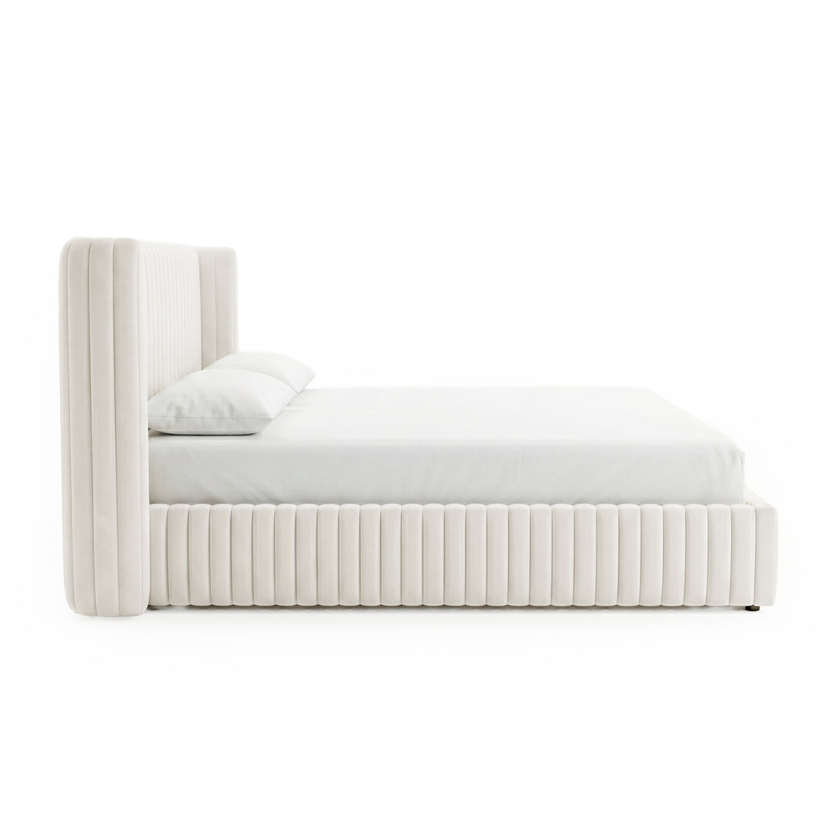 Side view of upholstered bed on white background