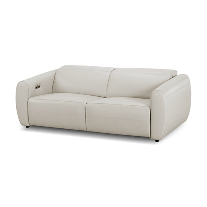 Modern cream-colored sofa on a white background
