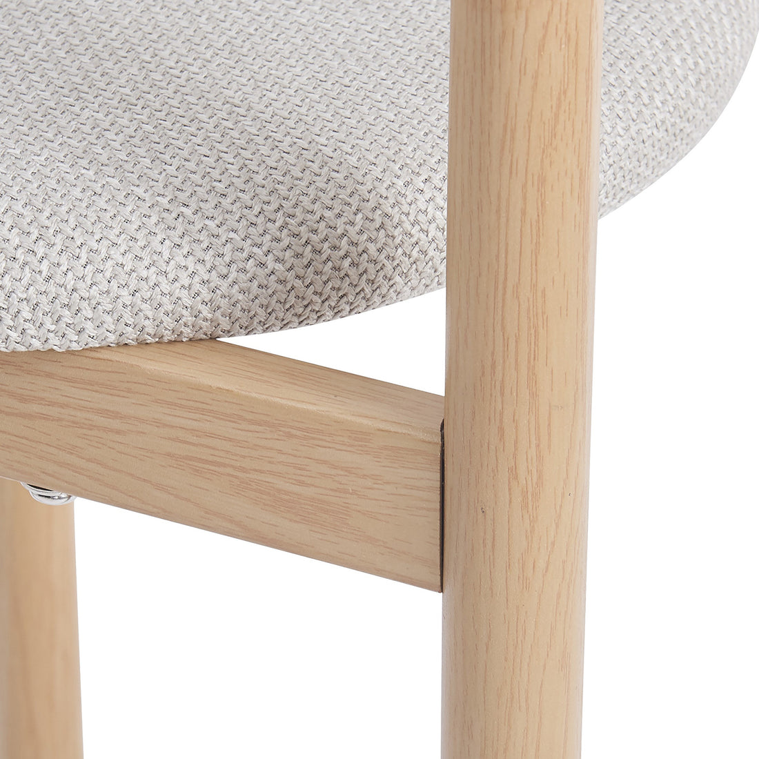 Close-up of a textured upholstered seat and wood leg detail on a white background