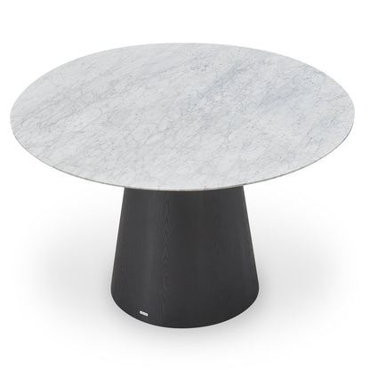 Dina 120cm Round Marble Dining Table in Carrara Black features a circular marble top with unique veining, resting on a solid black conical pedestal base, blending elegance and modern design.