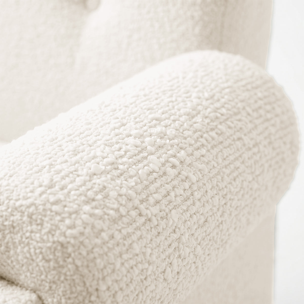 Close-up of armrest texture against neutral background