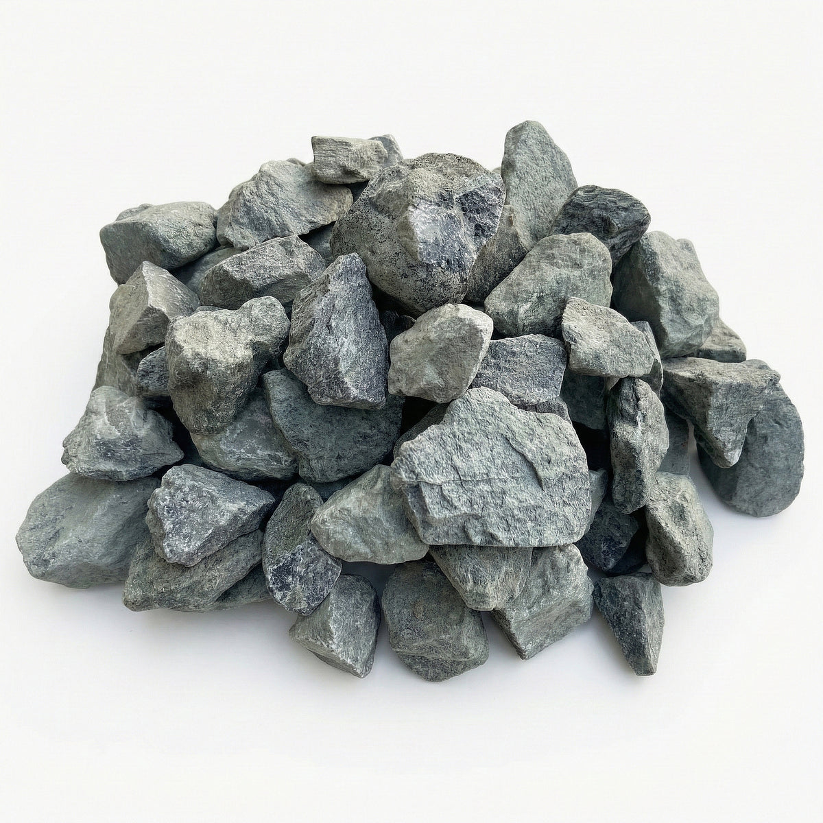 Neatly arranged pile of grey decorative stones on a white background