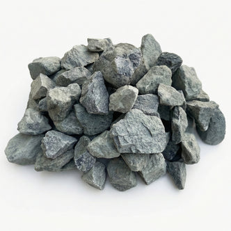Neatly arranged pile of grey decorative stones on a white background