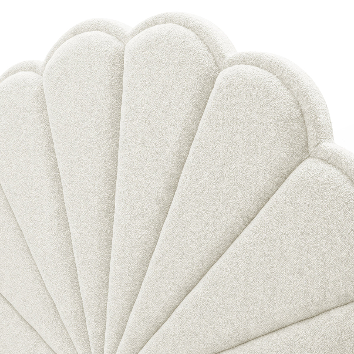 Close-up of scalloped upholstered texture on white background