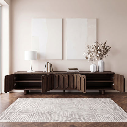 Dark wood sideboard styled in a modern living room